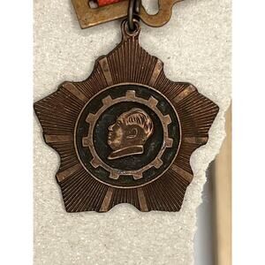 Vintage Bronze Industrial Medal with Red Ribbon Collectible Award Badge